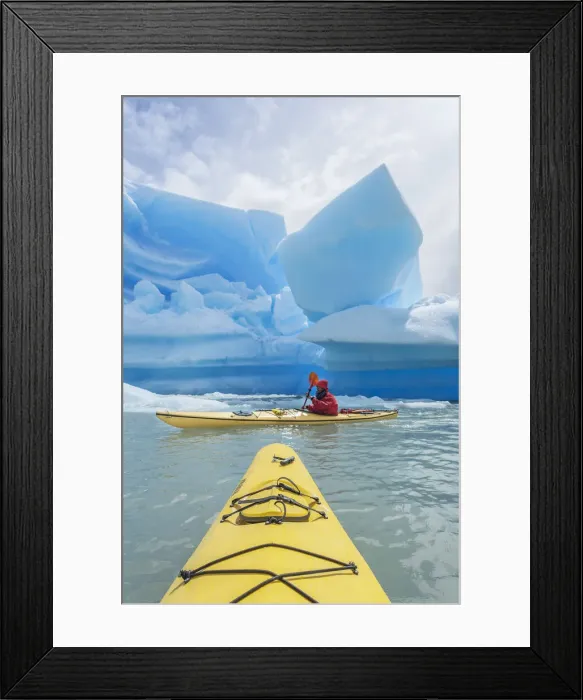 Framed Print : Kayaker paddling near icebergs, Torres del Paine National Park, Chile, MR Framed Print : Kayaker paddling near icebergs, Torres del Paine National Park, Chile, MR