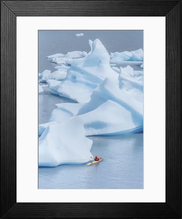 Framed Print : Kayaker paddling among icebergs, Torres del Paine National Park, Patagonia, Chile Framed Print : Kayaker paddling among icebergs, Torres del Paine National Park, Patagonia, Chile
