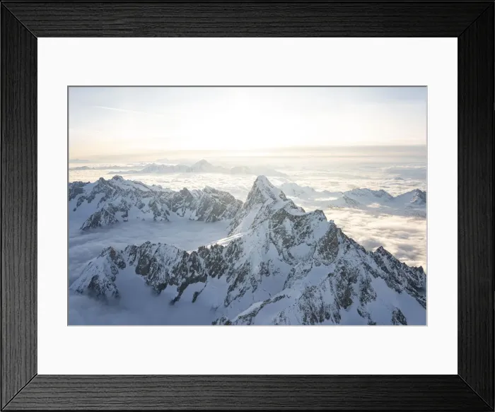 Framed Print : Aerial view of snowy peaks of Mont Blanc and Dent du Geant during sunrise, Courmayeur