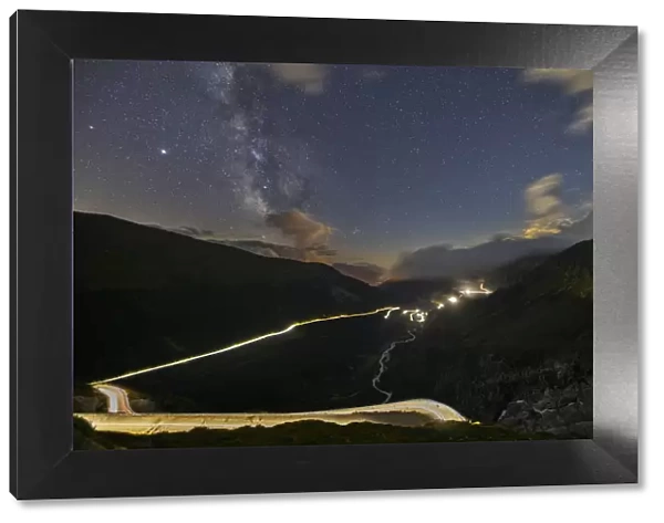Car lights and milkyway from Furkapass to Grimselpass during summer, Uri, Canton Vallese