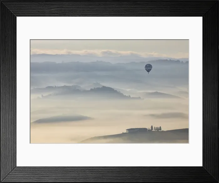 Framed Print : An hot air balloon flies over vineyards and mist during autumn, Cuneo, Langhe e Roero Framed Print : An hot air balloon flies over vineyards and mist during autumn, Cuneo, Langhe e Roero