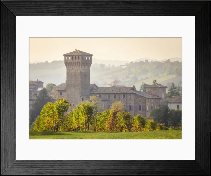 Framed Print : Autumnal view of the castle and vineyards of Levizzano Rangone Framed Print : Autumnal view of the castle and vineyards of Levizzano Rangone