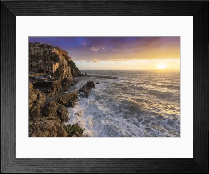 Framed Print : The small village of Manarola at sunset after a storm. Cinque Terre, La Spezia district