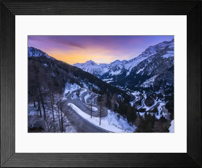 Framed Print : The winding curves of Maloja Pass road in winter at sunset, Bregaglia Valley, canton of Graubünden, Engadin, Switzerland Framed Print : The winding curves of Maloja Pass road in winter at sunset, Bregaglia Valley, canton of Graubünden, Engadin, Switzerland