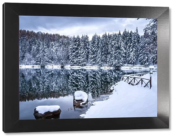 Meugliano lake with fresh snow, Valchiusella, Piedmont, Italy, Europe