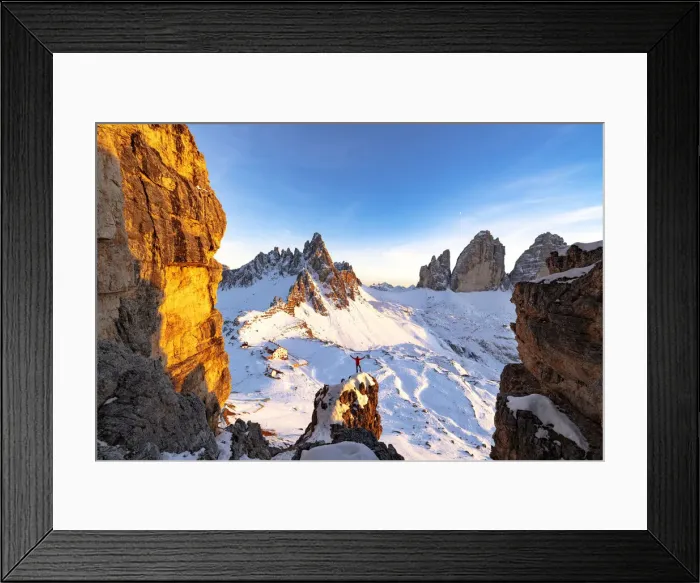 Framed Print : Cheerful man on top of rocks admiring Monte Paterno and Tre Cime di Lavaredo