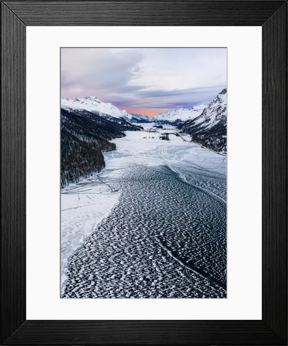 Framed Print : Ice and snow covering Lake Silvaplana during the winter sunrise, aerial view, Maloja Framed Print : Ice and snow covering Lake Silvaplana during the winter sunrise, aerial view, Maloja