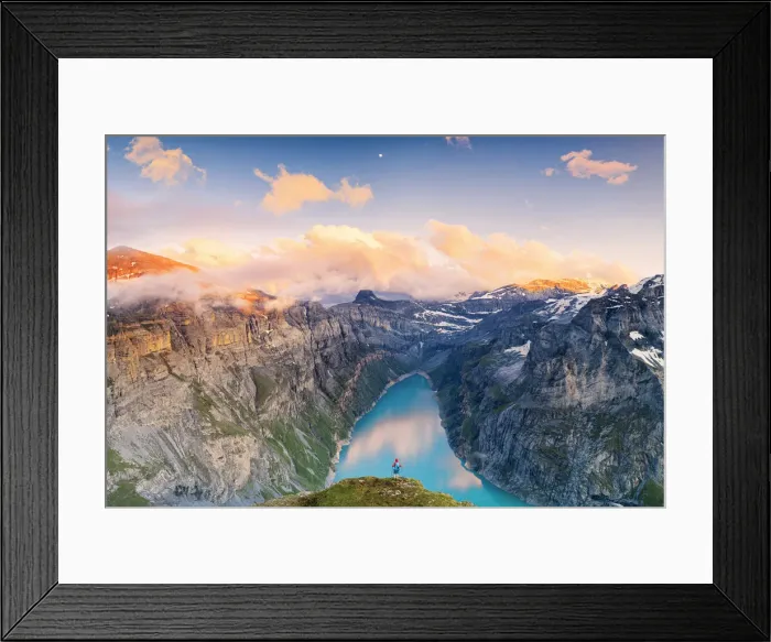 Framed Print : Hiker man with backpack admiring sunset over lake Limmernsee from top of rocks Framed Print : Hiker man with backpack admiring sunset over lake Limmernsee from top of rocks