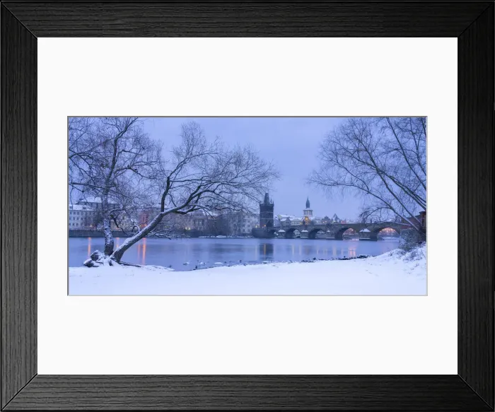Framed Print : Charles Bridge and Old Town Bridge Tower against snowy sky in winter, Prague, Bohemia