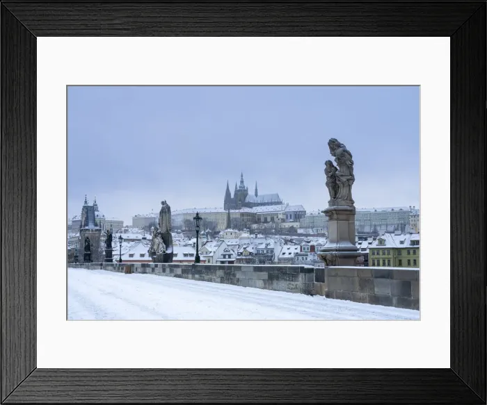 Framed Print : Statues at snow-covered Charles bridge and Prague Castle in winter, Prague, Bohemia Framed Print : Statues at snow-covered Charles bridge and Prague Castle in winter, Prague, Bohemia