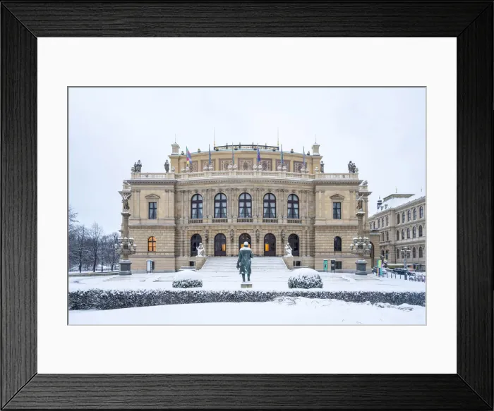 Framed Print : Snow-covered Antonin Dvorak statue in front of Rudolfinum concert hall in winter