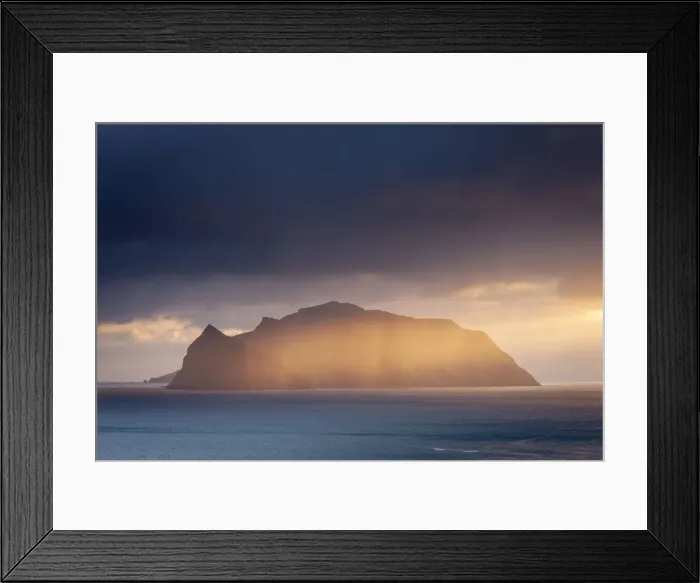 Framed Print : The mountainous island of Mykines, illuminated by a golden ray of evening sunshine Framed Print : The mountainous island of Mykines, illuminated by a golden ray of evening sunshine