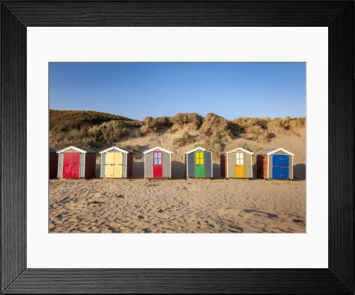 Framed Print : Colourful beach huts on Saunton Sands beach, Devon, England Framed Print : Colourful beach huts on Saunton Sands beach, Devon, England
