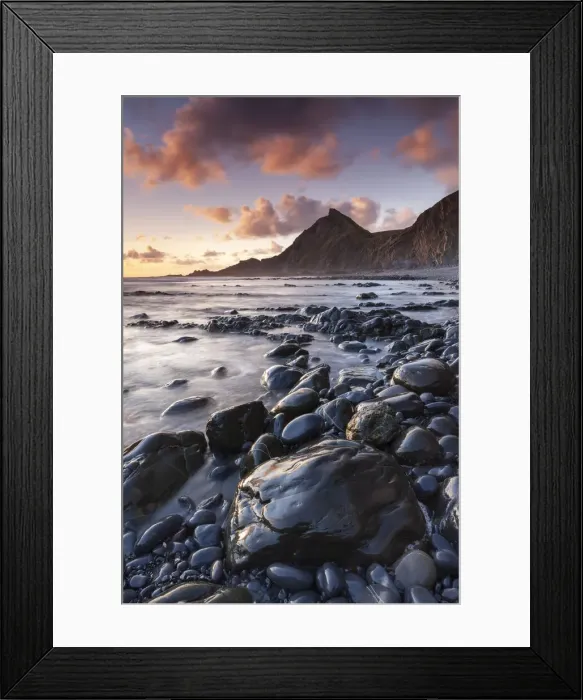 Framed Print : Colourful sunset clouds above St Catherines Tor, from the rocky shores of Spekes Mill Framed Print : Colourful sunset clouds above St Catherines Tor, from the rocky shores of Spekes Mill