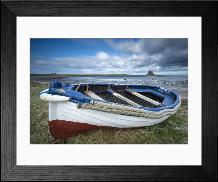 Framed Print : Fishing boat pulled ashore on the Holy Island of Lindisfarne, Northumberland, England Framed Print : Fishing boat pulled ashore on the Holy Island of Lindisfarne, Northumberland, England