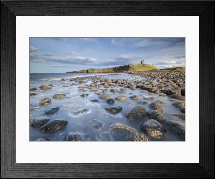 Framed Print : Dunstanburgh Castle from the rocky shores of Embleton Bay, Northumberland, England Framed Print : Dunstanburgh Castle from the rocky shores of Embleton Bay, Northumberland, England