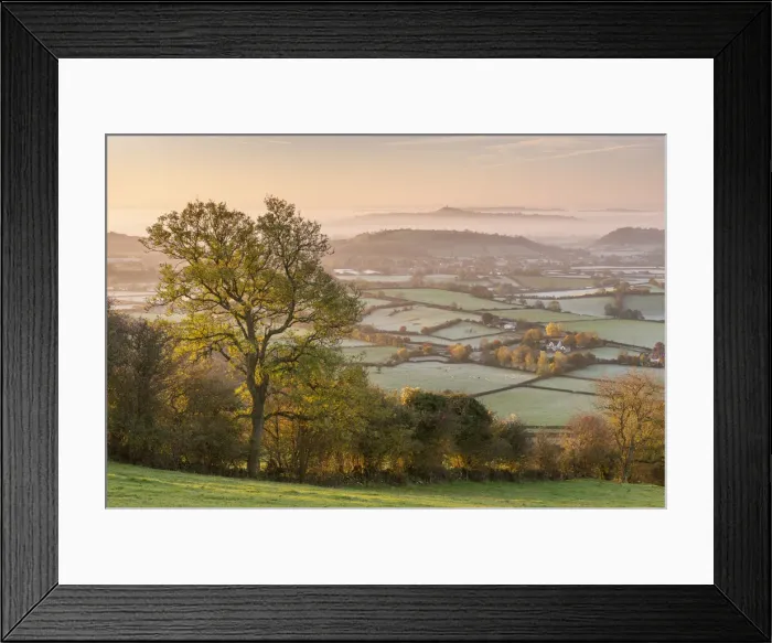 Framed Print : View from the Mendips over frost covered Somerset Levels towards Glastonbury Tor Framed Print : View from the Mendips over frost covered Somerset Levels towards Glastonbury Tor