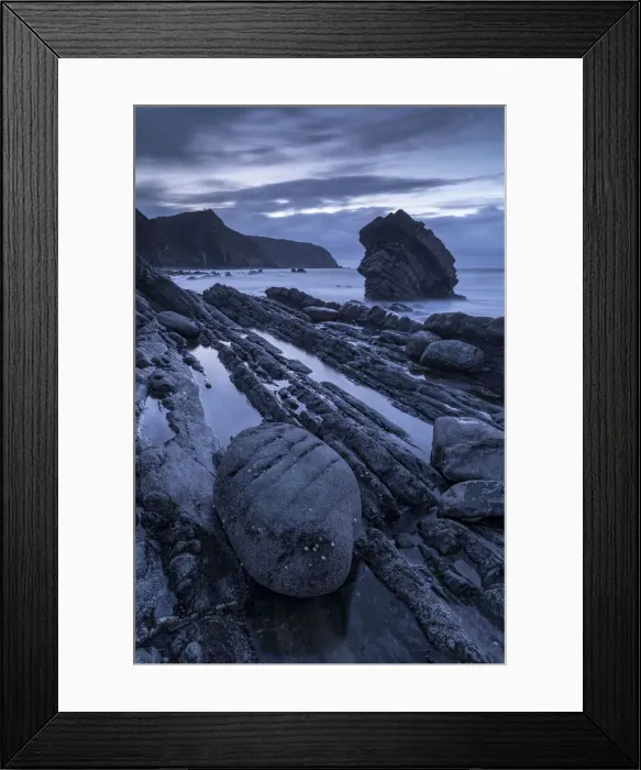 Framed Print : Twilight over the rocky shores of Mouthmill Beach on the North Devon coast, England Framed Print : Twilight over the rocky shores of Mouthmill Beach on the North Devon coast, England