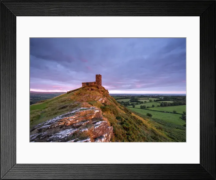Framed Print : Late evening sunlight glowing on Brentor Church, Dartmoor National Park, Devon, England Framed Print : Late evening sunlight glowing on Brentor Church, Dartmoor National Park, Devon, England