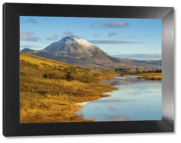 Ireland, Co. Donegal, Snow capped Errigal mountain and Clady river