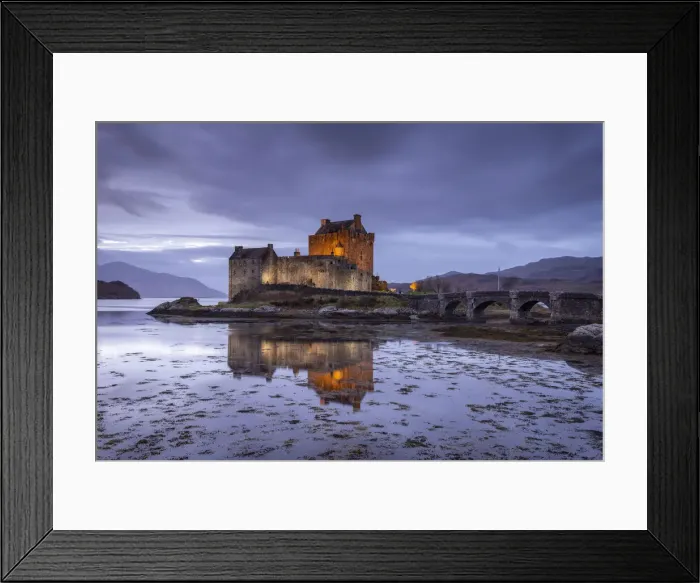 Framed Print : Eilean Donan Castle illuminated at twilight, Dornie, Scotland, UK Framed Print : Eilean Donan Castle illuminated at twilight, Dornie, Scotland, UK