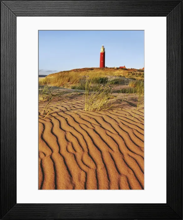 Framed Print : Dune landscape and lighthouse near De Cocksdorp - Netherlands, North Holland, Texel