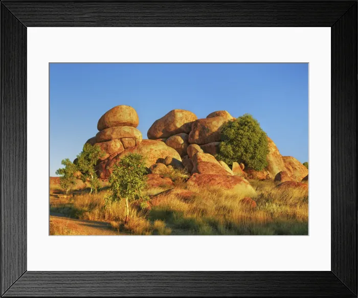 Framed Print : Rock formation at Devils Marbles with eucalyptus tree - Australia, Northern Territory Framed Print : Rock formation at Devils Marbles with eucalyptus tree - Australia, Northern Territory