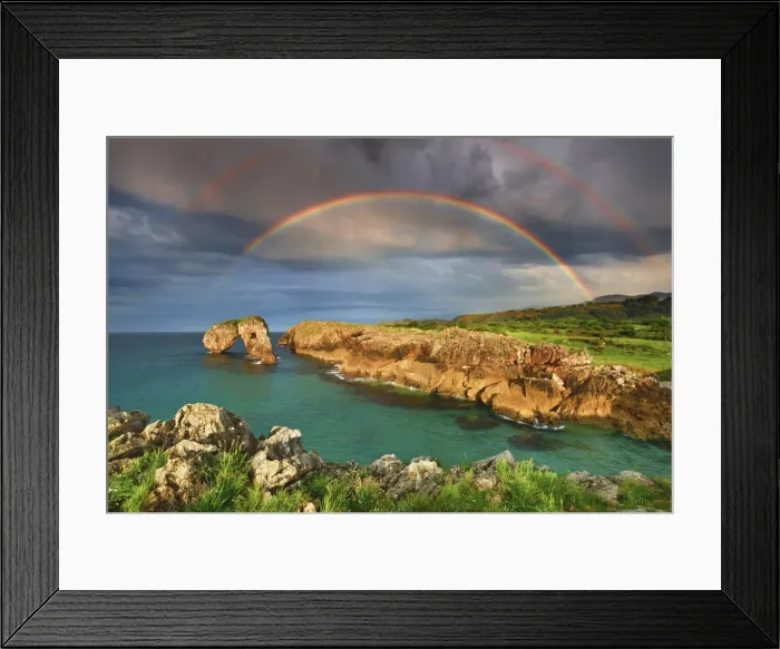 Framed Print : Cliff landscape with rock arch under rainbow - Spain, Asturias, Oriente, Ribadesella Framed Print : Cliff landscape with rock arch under rainbow - Spain, Asturias, Oriente, Ribadesella