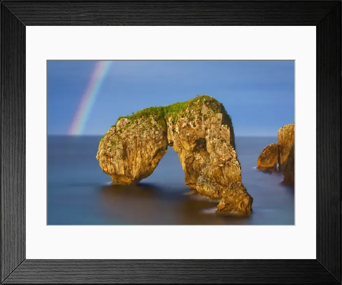 Framed Print : Cliff landscape with rock arch under rainbow - Spain, Asturias, Oriente, Ribadesella Framed Print : Cliff landscape with rock arch under rainbow - Spain, Asturias, Oriente, Ribadesella