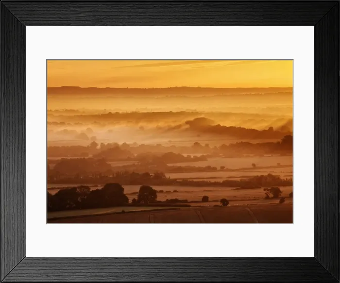 Framed Print : Dawn mist and rolling chalk downland viewed from Wilmington Hill, Willmington Framed Print : Dawn mist and rolling chalk downland viewed from Wilmington Hill, Willmington