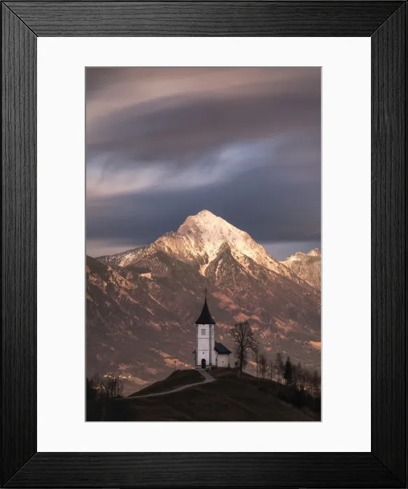 Framed Print : Church of St. Primoz and Storzic Mountain at sunset, Slovenia Framed Print : Church of St. Primoz and Storzic Mountain at sunset, Slovenia