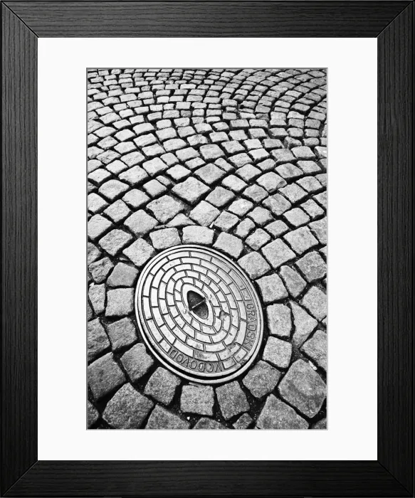 Framed Print : Close-up deatil showing cobbled street and manhole cover, Ljubljana, Slovenia Framed Print : Close-up deatil showing cobbled street and manhole cover, Ljubljana, Slovenia