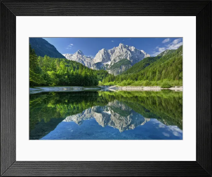 Framed Print : Peaks of Prisojnik and Razor reflected in pools beside the Velika Pisnca River in summer