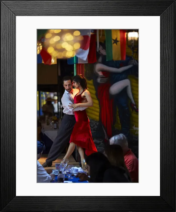 Framed Print : A couple of tango dancers perform a live-show in a restaurant of La Boca, Buenos Aires Framed Print : A couple of tango dancers perform a live-show in a restaurant of La Boca, Buenos Aires