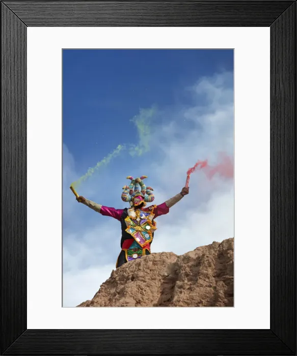 Framed Print : A devil mask of the Uquia's Carnival with bengala's during the Descents of the Devil's, Jujuy, Argentina. Hundreds of devils descend from the Cerro Blanco hill to celebrate the start of Carnival Framed Print : A devil mask of the Uquia's Carnival with bengala's during the Descents of the Devil's, Jujuy, Argentina. Hundreds of devils descend from the Cerro Blanco hill to celebrate the start of Carnival