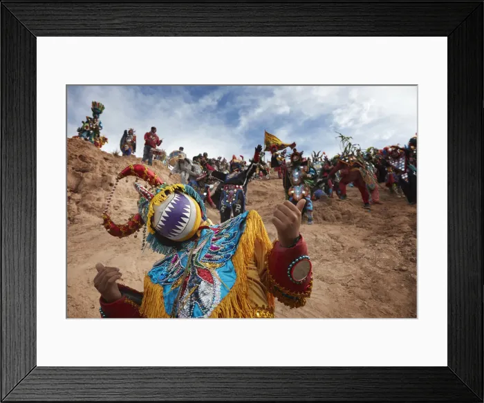 Framed Print : The Descent of the Devil's from the sacred Cerro Blanco hill in Uquia, Jujuy, Argentina. Hundreds of devils descend from the Cerro Blanco hill to celebrate the start of Carnival Framed Print : The Descent of the Devil's from the sacred Cerro Blanco hill in Uquia, Jujuy, Argentina. Hundreds of devils descend from the Cerro Blanco hill to celebrate the start of Carnival