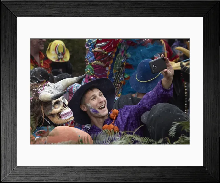 Framed Print : A participant of the Carnival in Uquia takes a selfie with a devil, Jujuy, Argentina. Hundreds of devils descend from the Cerro Blanco hill to celebrate the start of Carnival Framed Print : A participant of the Carnival in Uquia takes a selfie with a devil, Jujuy, Argentina. Hundreds of devils descend from the Cerro Blanco hill to celebrate the start of Carnival
