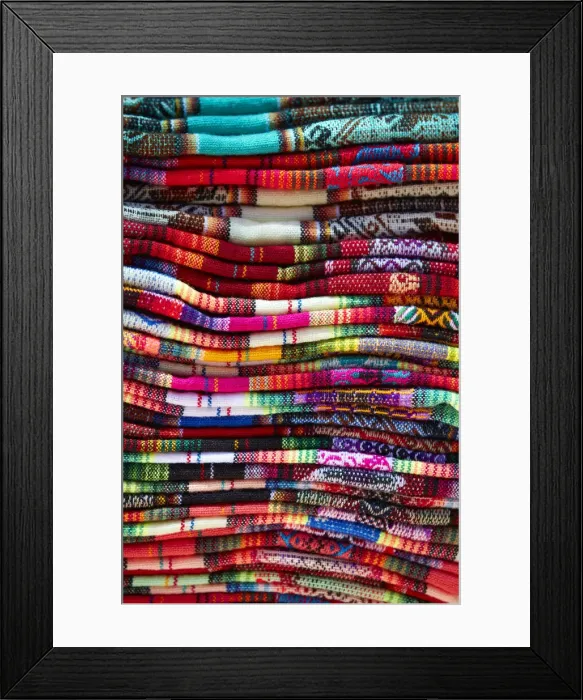 Framed Print : A detail of the vibrant colors of northern Argentinian textiles from a street stand of