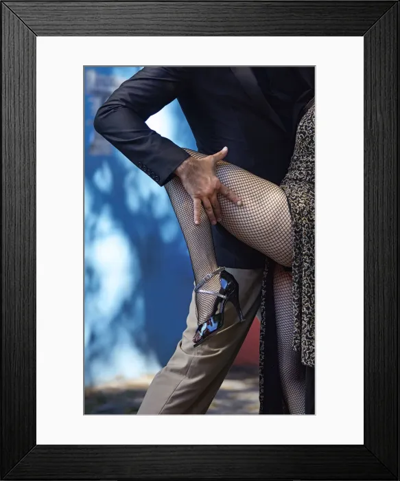 Framed Print : Detail of a couple of Tango dancers in the colorful Caminito de la Boca, Buenos Aires, Argentina. (MR)