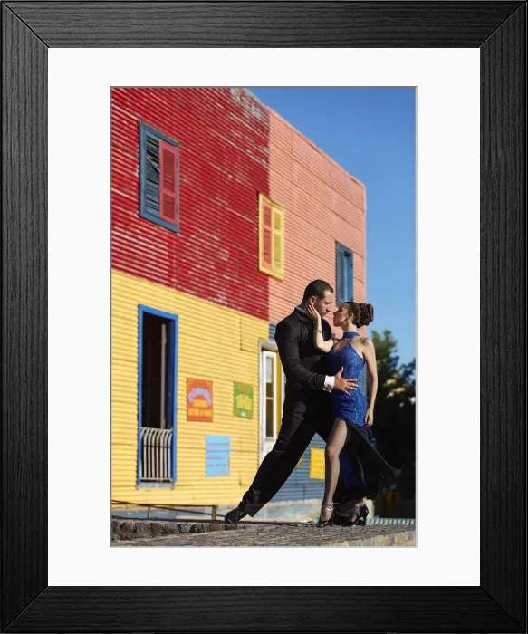 Framed Print : A couple of Professional Tango dancers with a colorful house of La Boca neighborhood in the background, Buenos Aires, Argentina. (MR) Framed Print : A couple of Professional Tango dancers with a colorful house of La Boca neighborhood in the background, Buenos Aires, Argentina. (MR)
