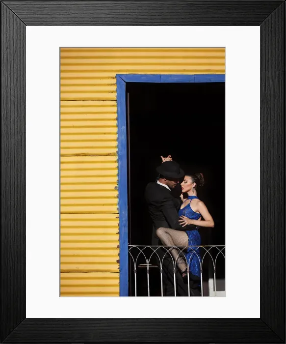 Framed Print : A couple of Professional Tango dancers inside a colorful house of La Boca, Buenos Aires, Argentina. (MR) Framed Print : A couple of Professional Tango dancers inside a colorful house of La Boca, Buenos Aires, Argentina. (MR)