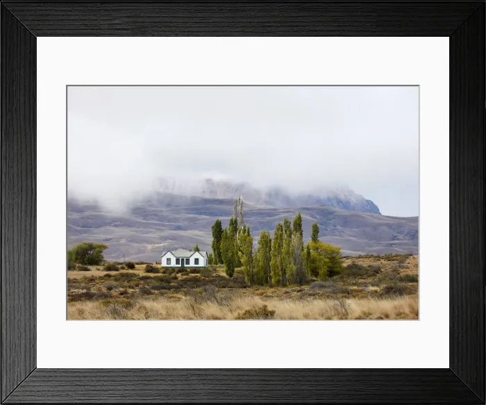 Framed Print : A small traditional house surrounded by the Patagonian landscape Framed Print : A small traditional house surrounded by the Patagonian landscape