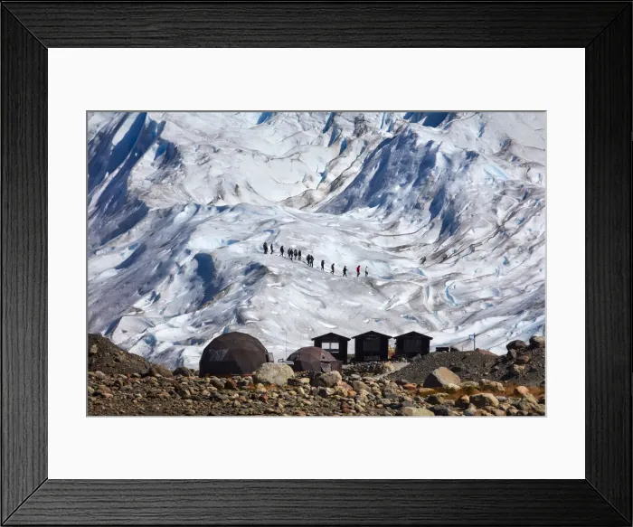 Framed Print : A group of tourists walk on the surface of the Perito Moreno Glacier, Southern Patagonian Ice Field, El Calafate, Argentina Framed Print : A group of tourists walk on the surface of the Perito Moreno Glacier, Southern Patagonian Ice Field, El Calafate, Argentina