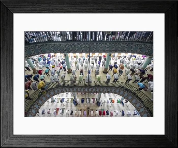Framed Print : People come together to pray over several floors of one of the biggest mosques in Framed Print : People come together to pray over several floors of one of the biggest mosques in