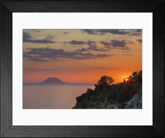 Framed Print : Sunset at Capo Vaticano, with Stomboli in the background, Vibo Valentia province, Italy Framed Print : Sunset at Capo Vaticano, with Stomboli in the background, Vibo Valentia province, Italy
