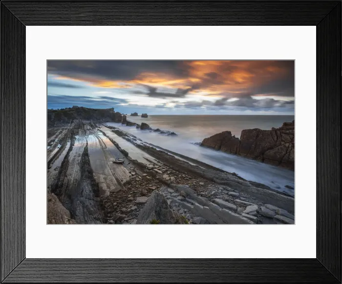 Framed Print : Colorful clouds during sunset at Playa de la Arnia, Boo de Pielagos, Cantabria, Spain Framed Print : Colorful clouds during sunset at Playa de la Arnia, Boo de Pielagos, Cantabria, Spain