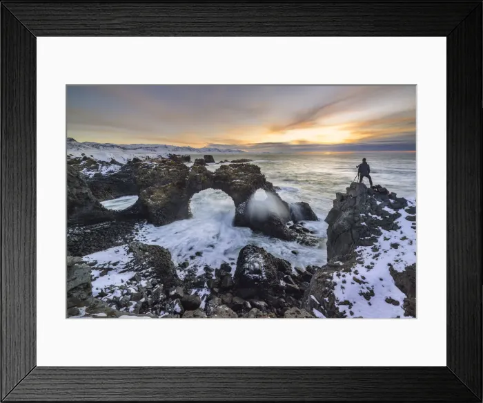 Framed Print : A photographer at Gatklettur arch during winter sunrise, Arnarstapi, Hellnar Framed Print : A photographer at Gatklettur arch during winter sunrise, Arnarstapi, Hellnar