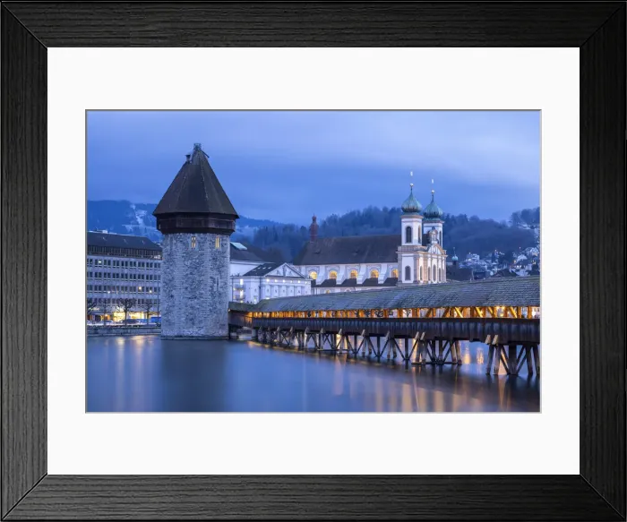 Framed Print : View of the Kapellbrucke bridge, the Jesuit Church and the Wasserturm at blue hour reflected on the Reuss river. Lucerne, canton of Lucerne, Switzerland