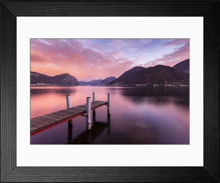 Framed Print : Sunrise explosion of colors in front of Lugano and Campione d Framed Print : Sunrise explosion of colors in front of Lugano and Campione d