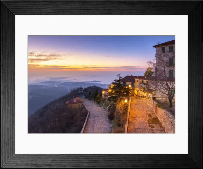 Framed Print : View of the old town of Santa Maria del Monte in winter at sunrise with the fog on Varese Framed Print : View of the old town of Santa Maria del Monte in winter at sunrise with the fog on Varese